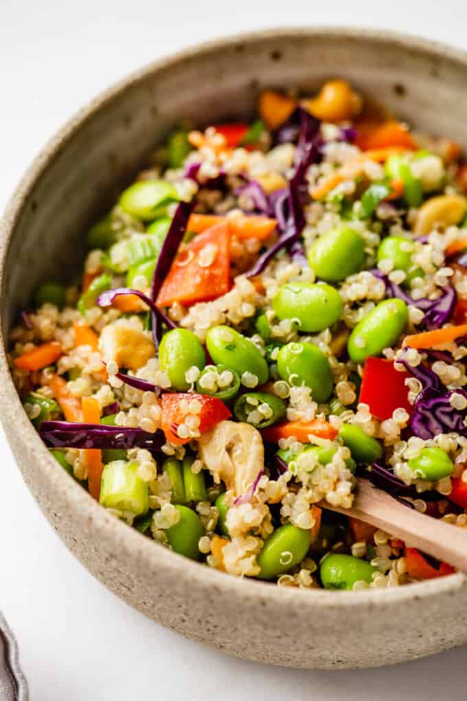 A close up of edamame quinoa salad in a bowl